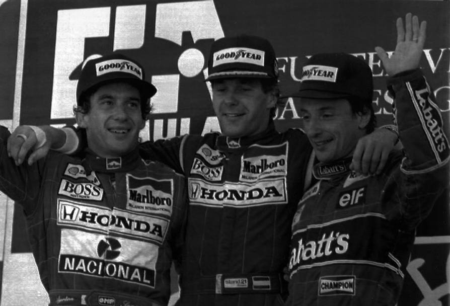 La vittoria mondiale del 1991 arriv nel Gran Premio del Giappone il 20 ottobre grazie a un secondo posto sul traguardo di Suzuka. Qui il campione brasiliano sul podio col vincitore della gara, l&#39;austriaco Gerhard Berger, e il terzo all&#39;arrivo Riccardo Patrese (Afp)